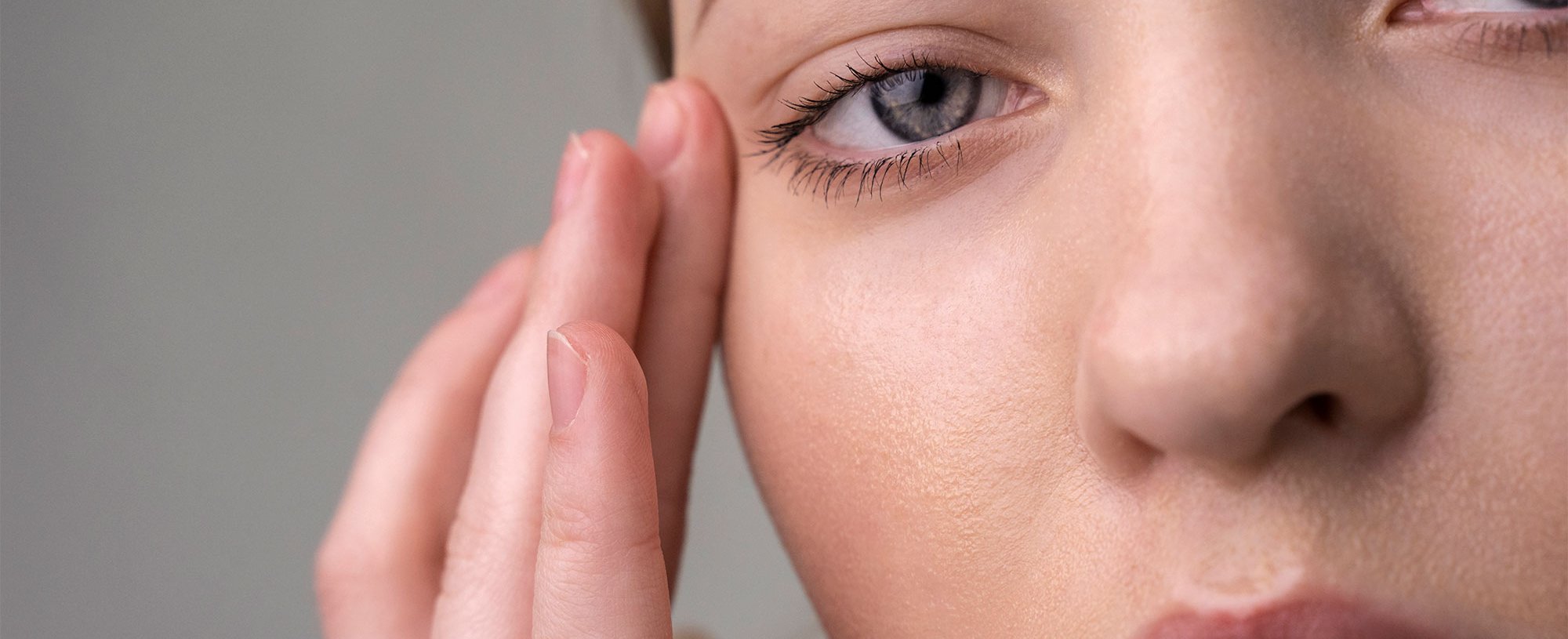 Close Up Portrait Woman With Hydrated Skin